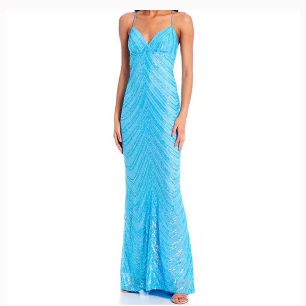 B. Darlin Pattern Sequin Cross Back Long
Dress